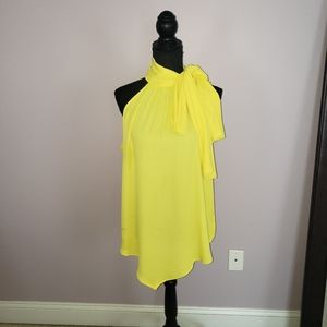 Yellow sleeveless wrap shirt